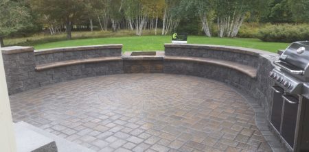 Bow Patio with Built in Benches and Firepit